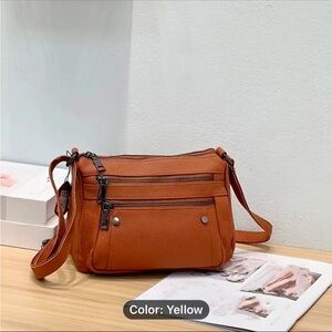 Pebble leather handbag purse

9” x 4” x 7”